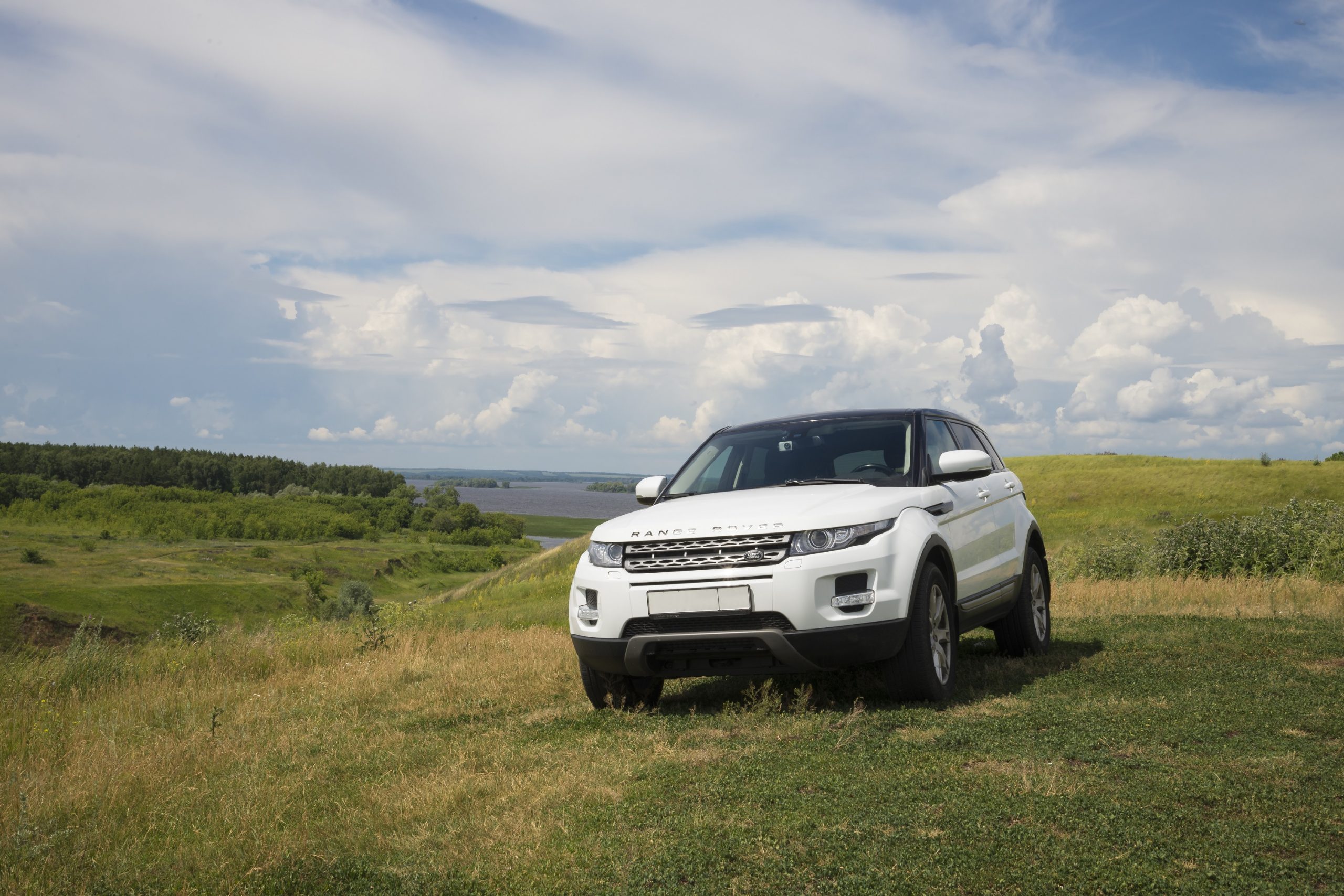 Land Rover on grassy hill